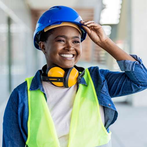 woman with hard hat at work site